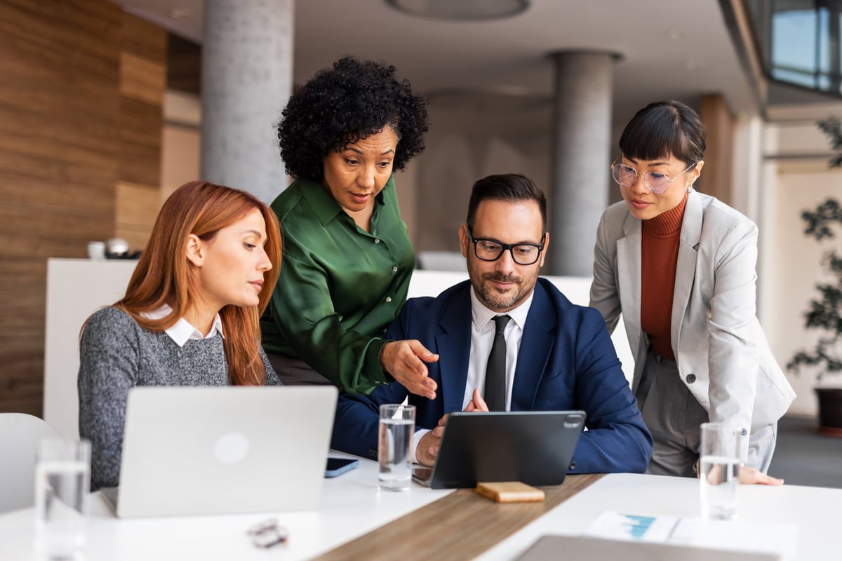 Team collaborating on AI and automation projects in a modern office