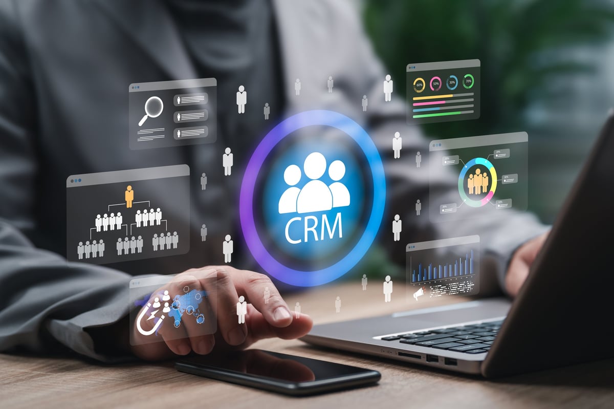 Business owner using a CRM system to manage customer relationships and follow-up