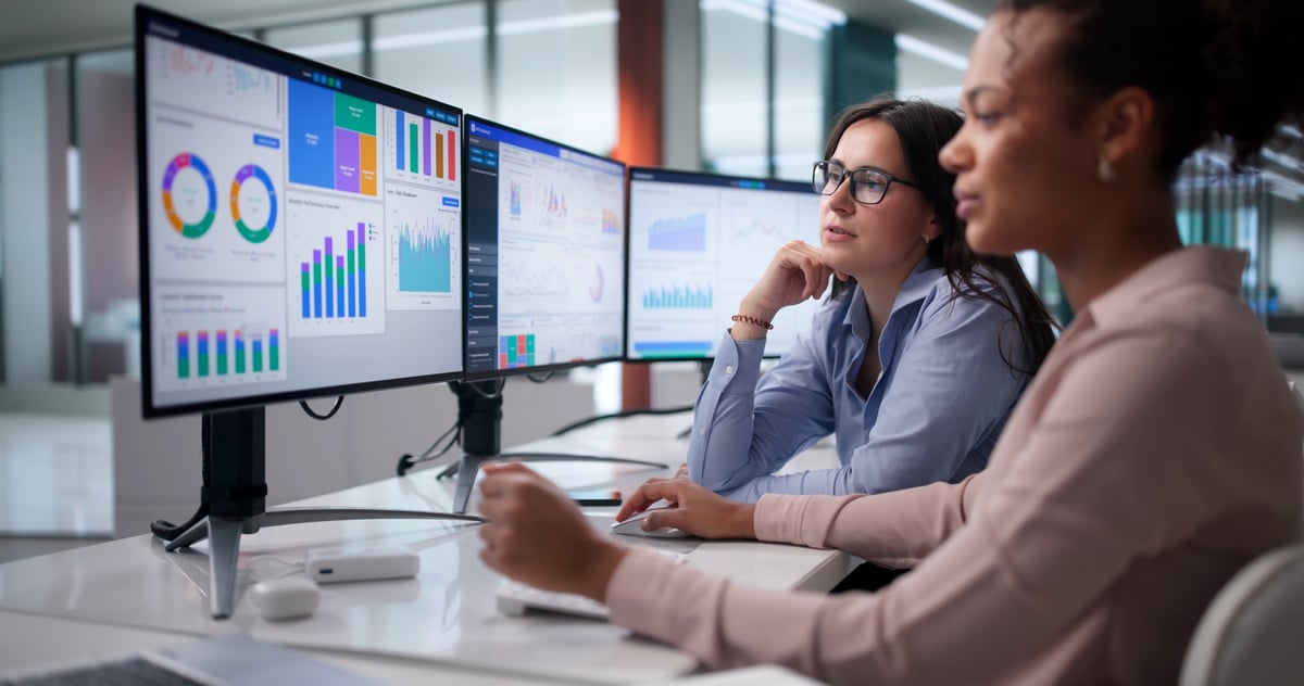Analytics team reviewing data and growth metrics in a modern office