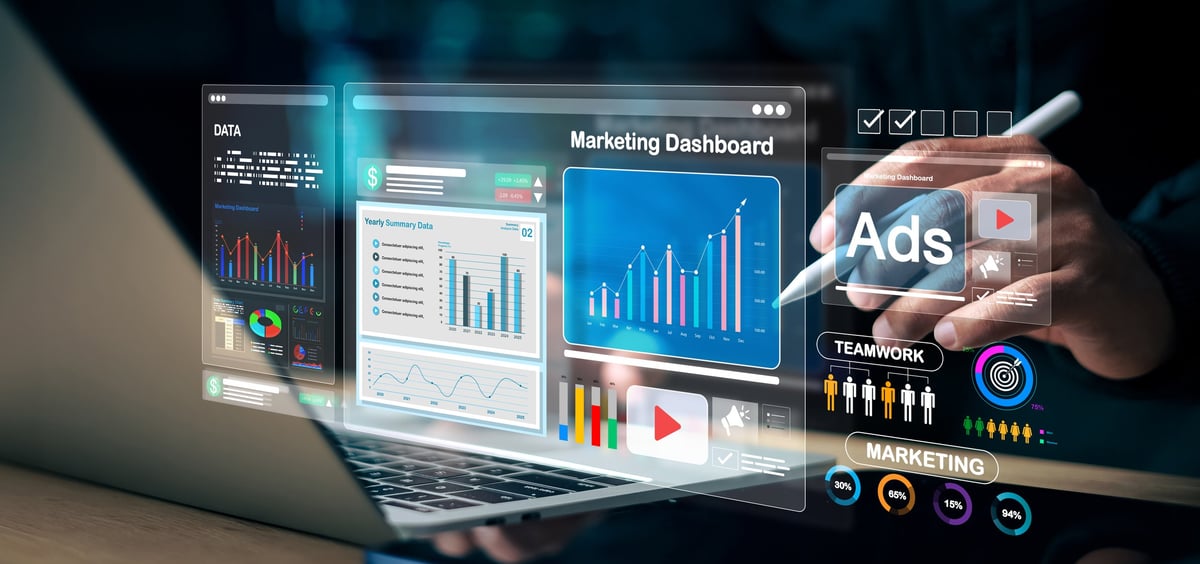 Marketer reviewing digital advertising performance data on a campaign dashboard